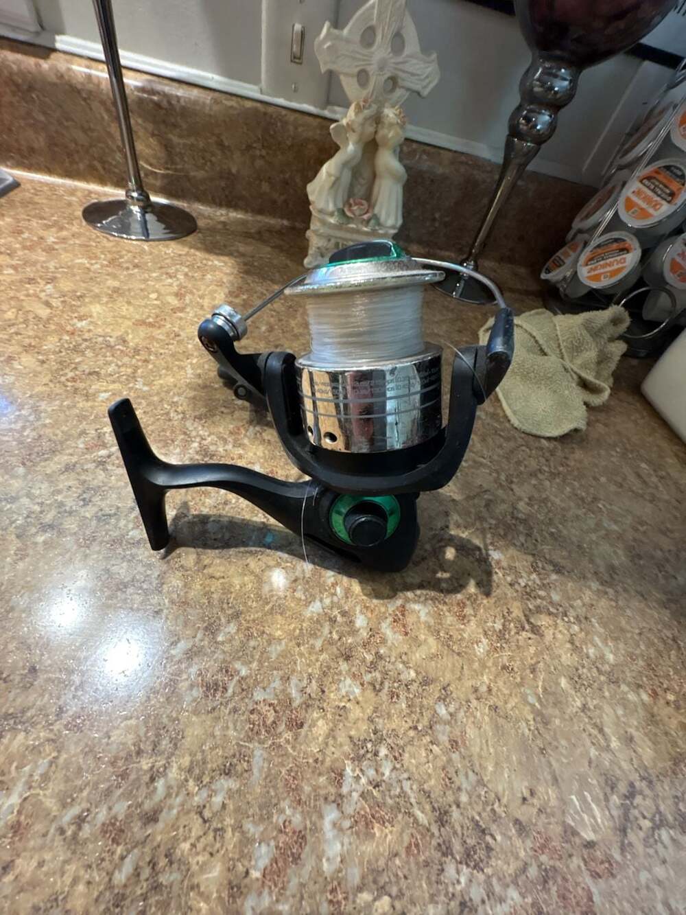 Black and Green Spinning Fishing Reel with Pre-Spooled Line
